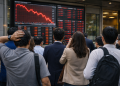 Hong Kong financial stocks tumble as China tightens offshore checks